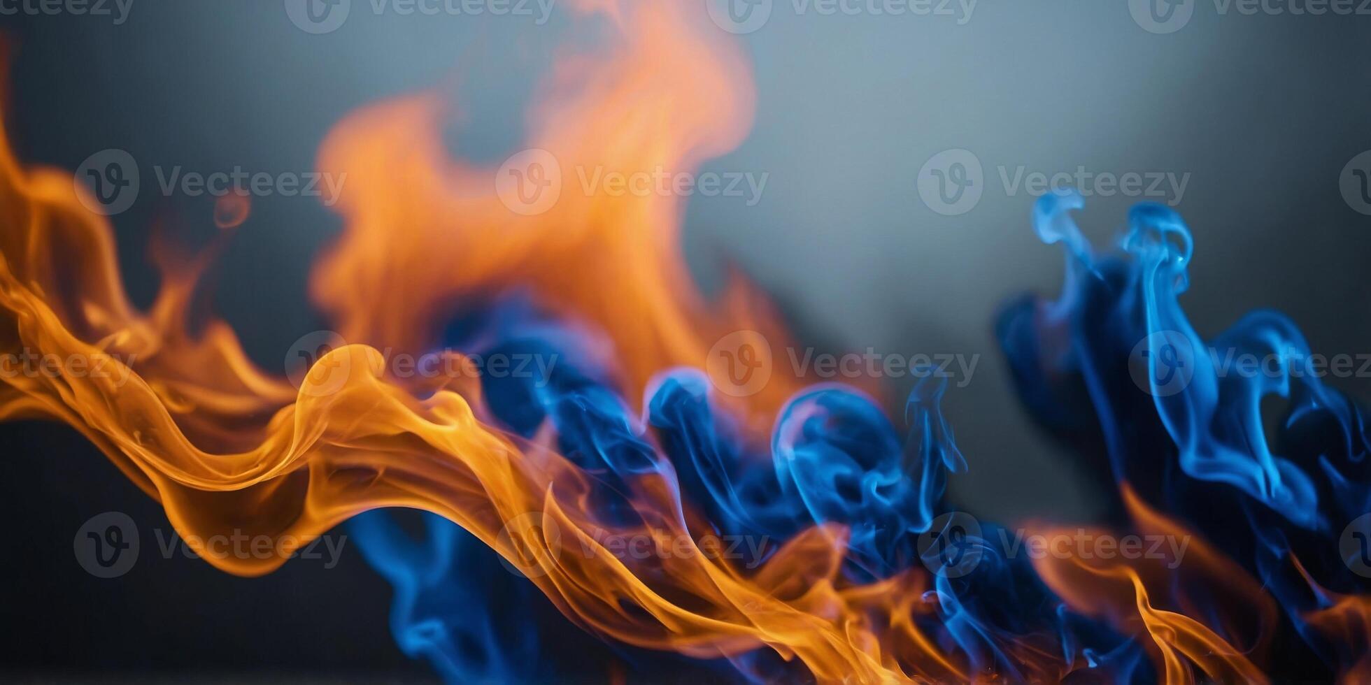 A blue and orange flame with a blurry background. photo