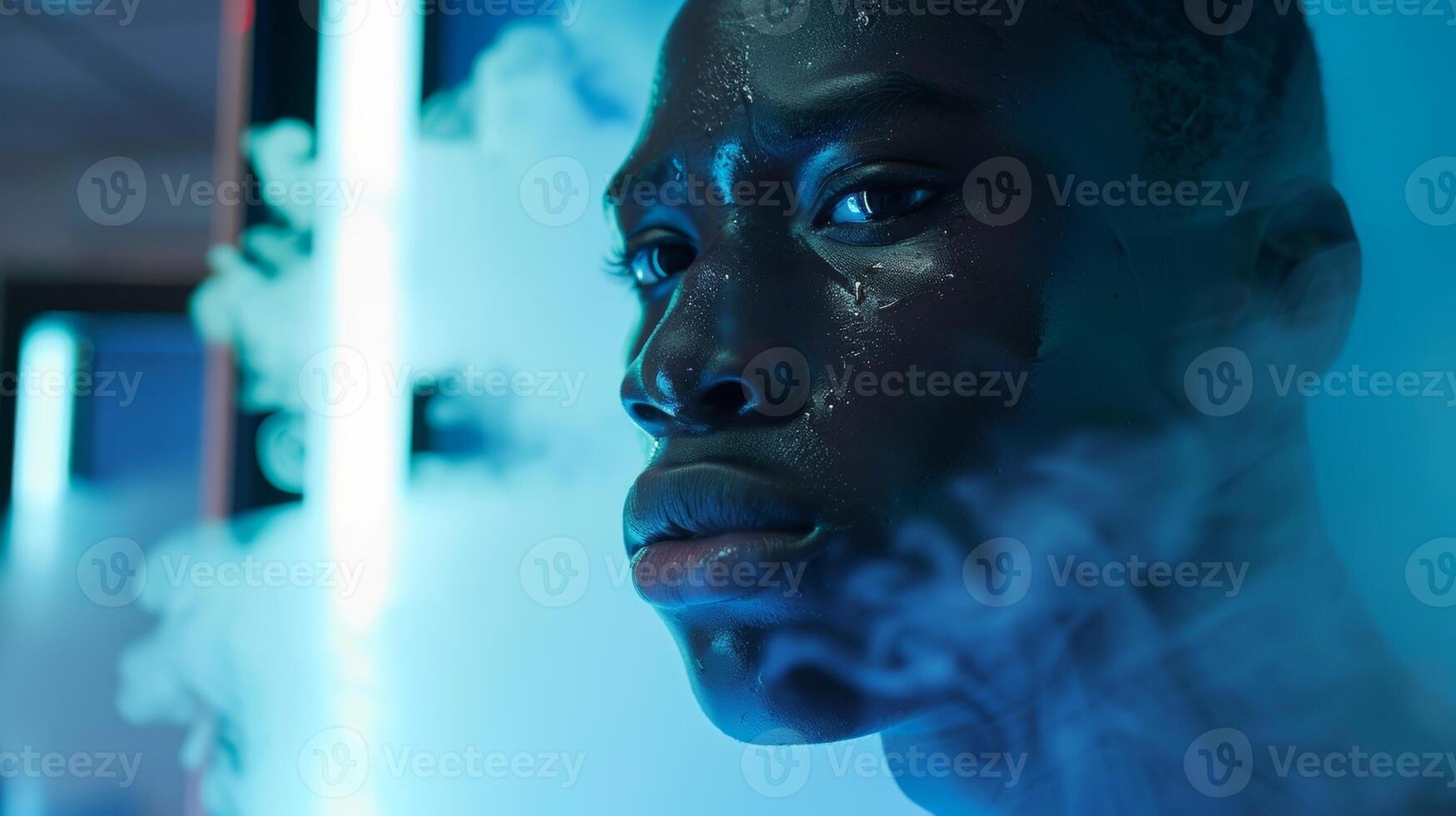 A young athlete stands inside the cryotherapy machine preparing for a game by using the treatment to boost their performance and reduce inflammation photo
