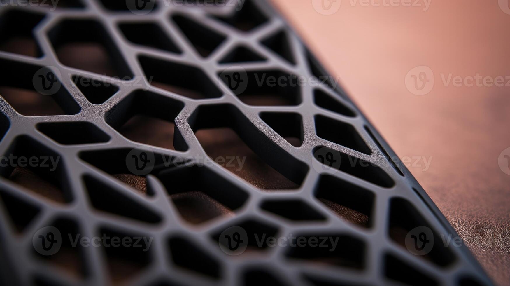 Closeup of a 3D printed phone case, featuring a unique lattice design and a smooth finish. photo