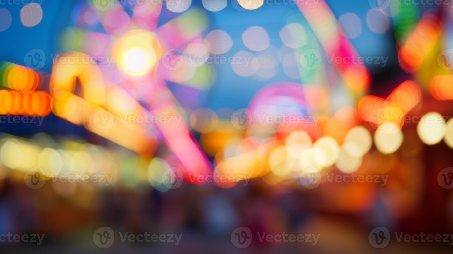 A defocused shot capturing the vibrant atmosphere of the festival grounds photo