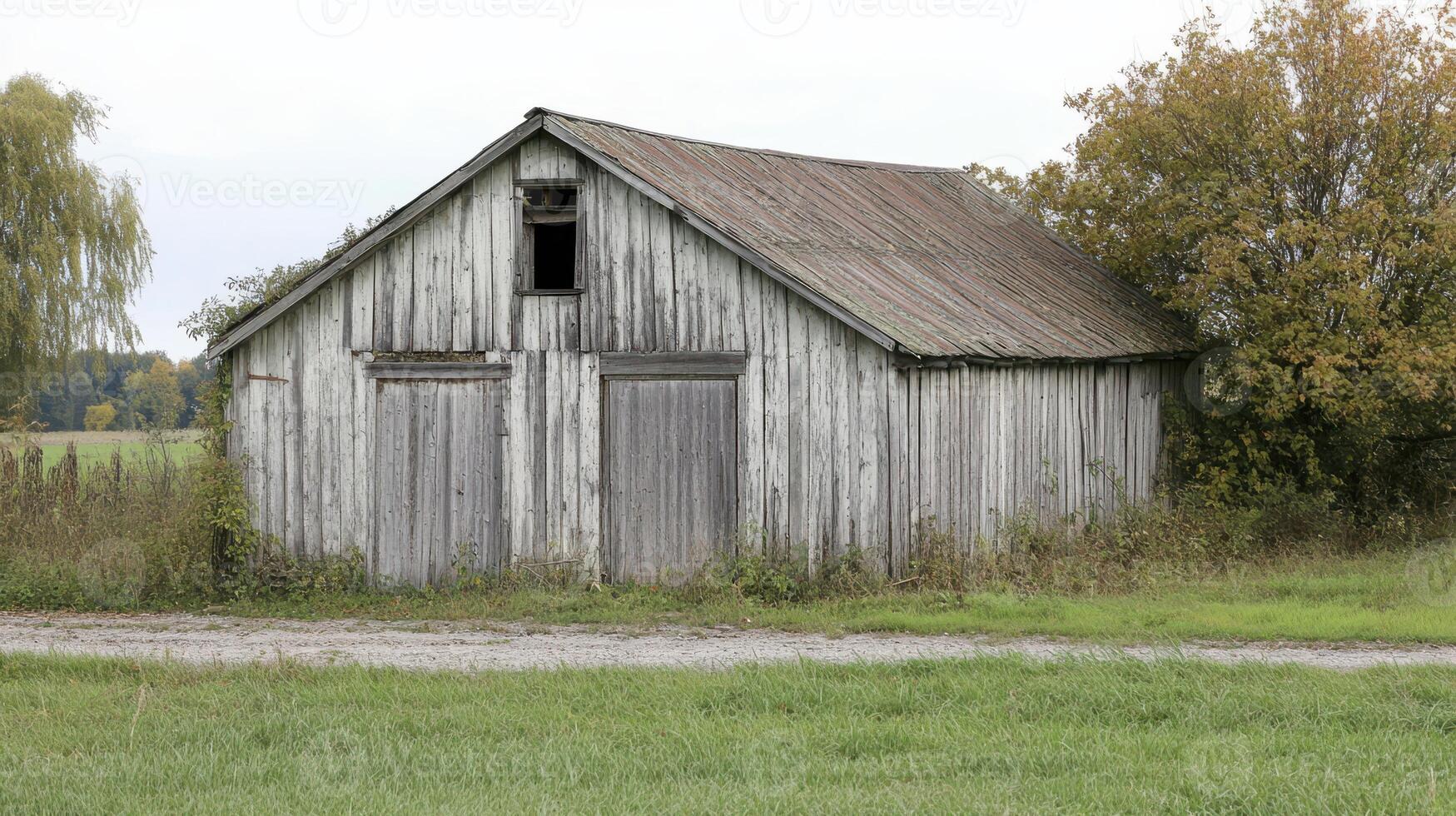 Aging wooden building set for demolition, showing signs of wear. photo