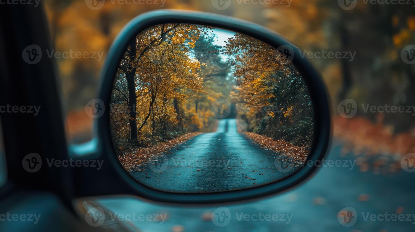 Mirror reflection on the road, capturing a view of the surroundings. photo
