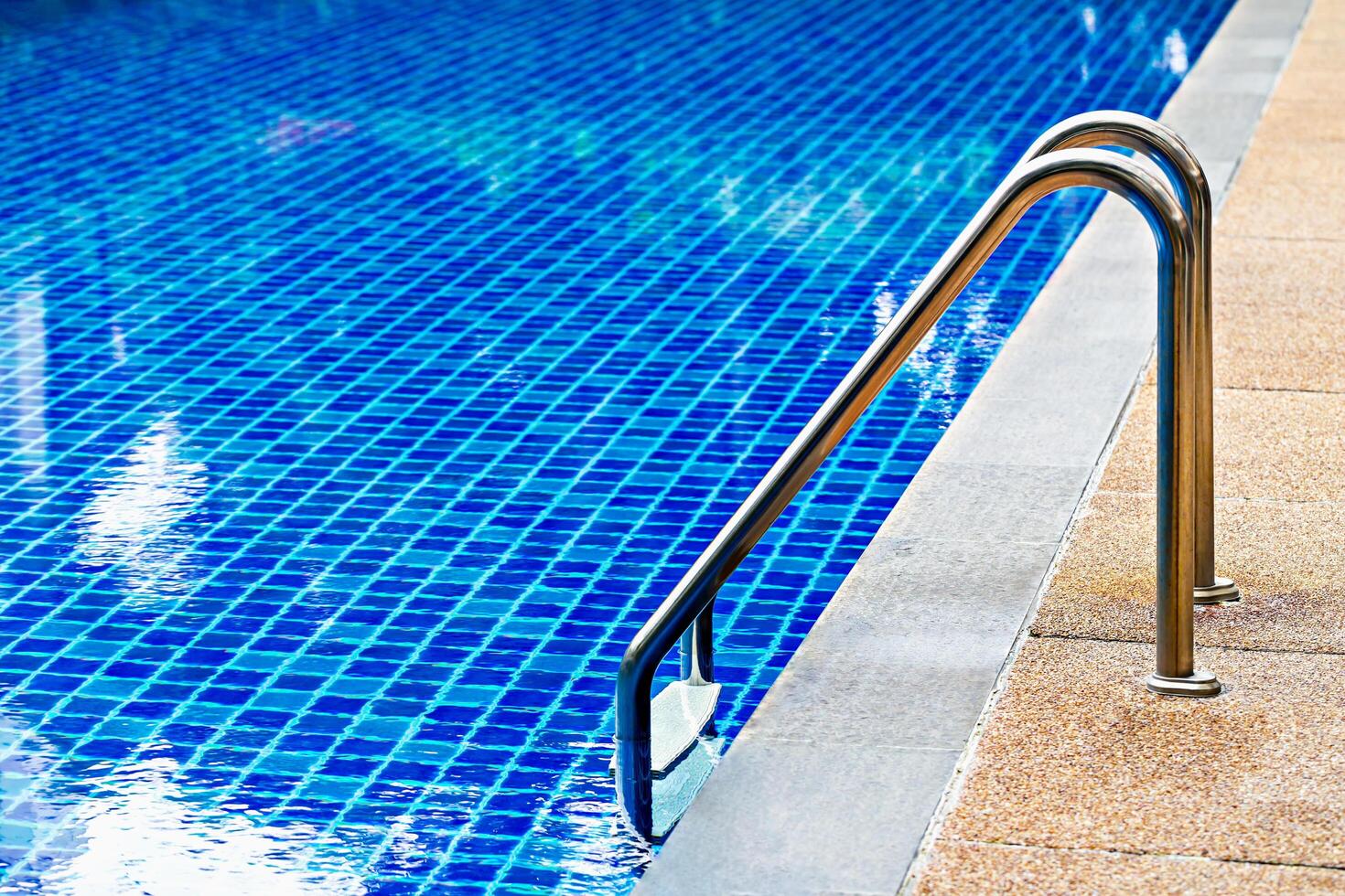 Steel stairs to pool photo