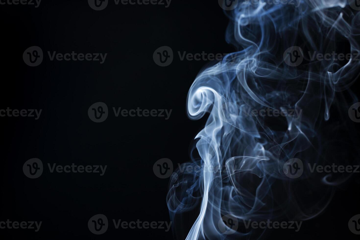 Smoke from flames or fog clouds graphic design art isolated on dark black background. photo