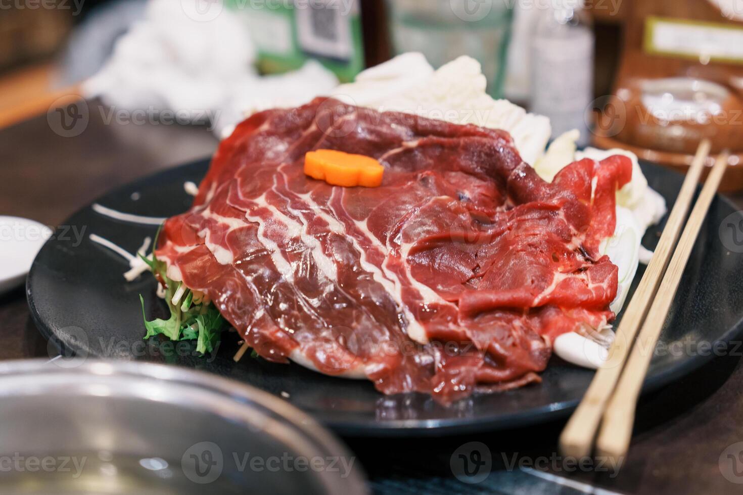 horse meat pieces or Japanese Baniku. Sakura niku ready for hot pot cooking menu. Premium meat and famous food in Matsumoto city, Nagano Prefecture, Japan photo