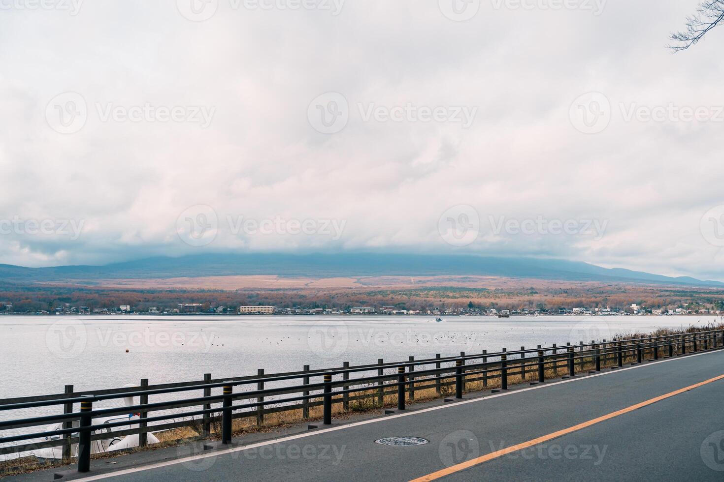 Mount Fuji at lake Yamanaka near Kawaguchiko, one of the Fuji Five Lakes located in Yamanashi, Japan. Landmark for tourists attraction. Japan Travel, Destination, Vacation and Mount Fuji Day concept photo