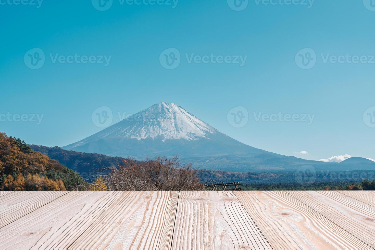 Empty wood table mockup with Mount Fuji view at Saiko Iyashino Sato Nenba background and copy space for text, Mock up for your product display and montage in autumn season. Japan travel and vacation photo