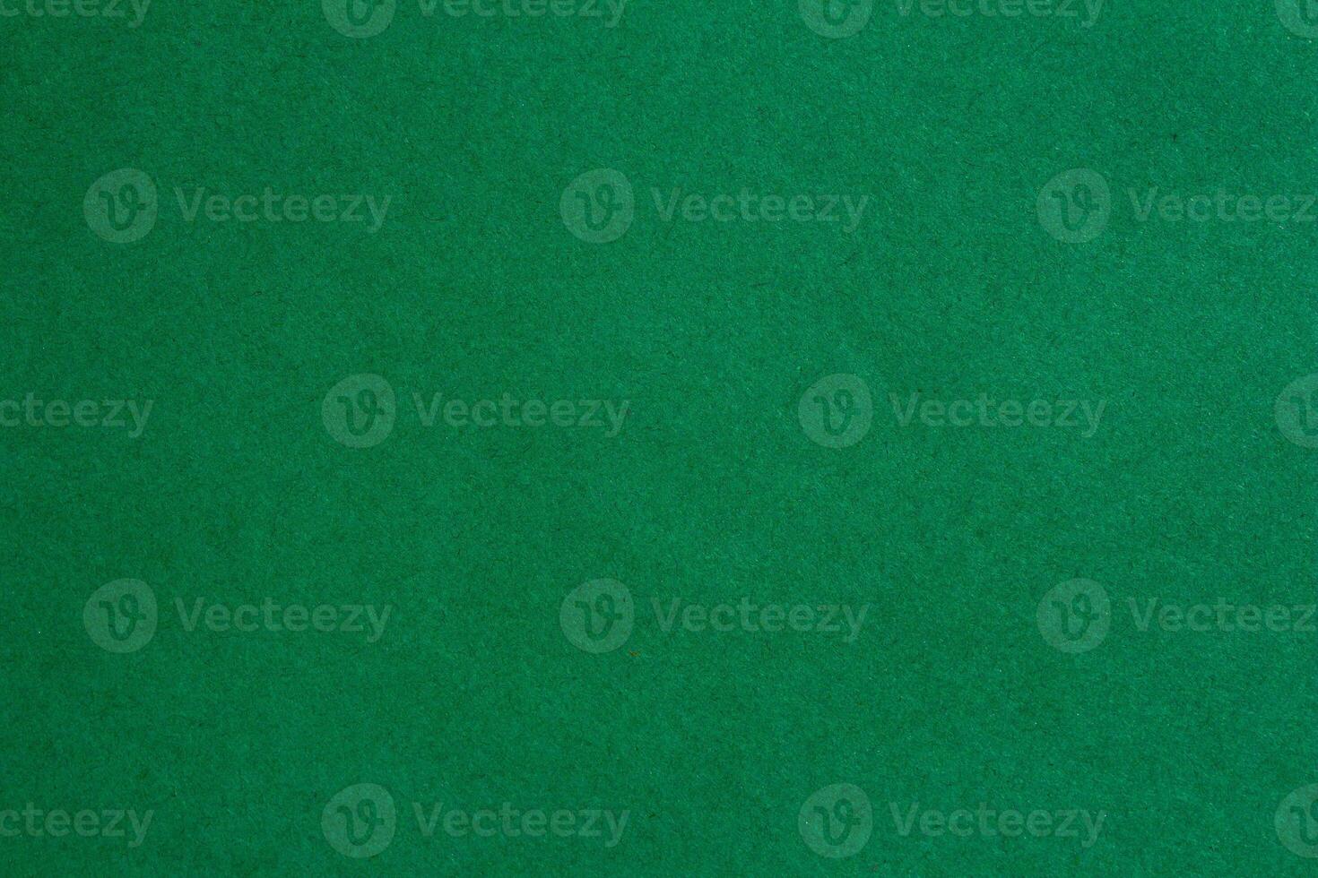 Green paper texture with copy space, paper background photo