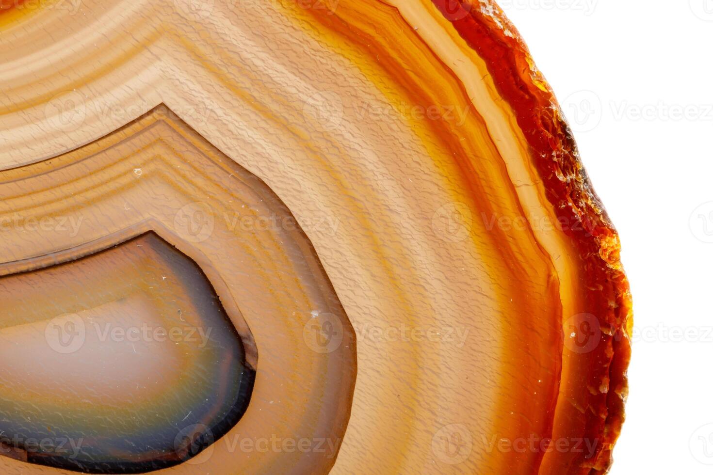 Macro mineral stone Yellow, brown Agate breed a white background photo