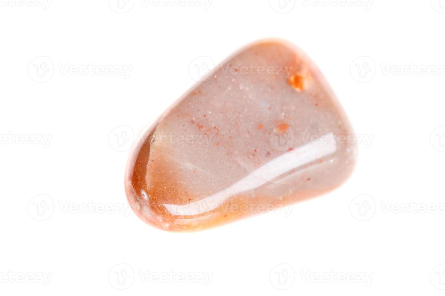 Macro mineral stone Carnelian on white background photo