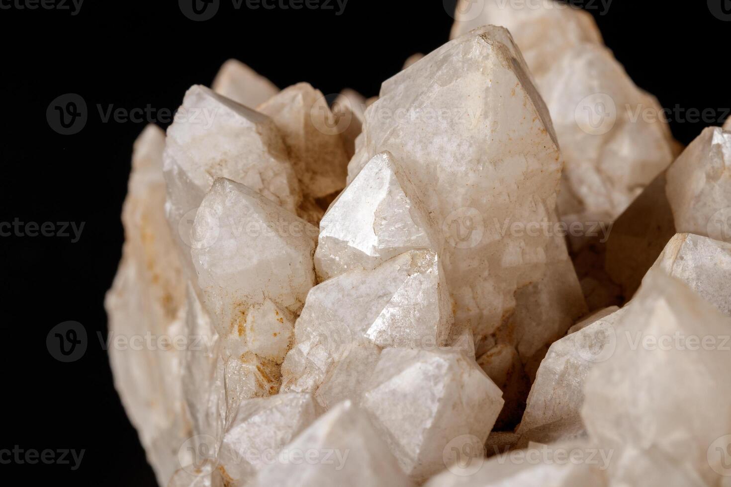 Macro Mineral Snow quartz Crystals on Black Background photo