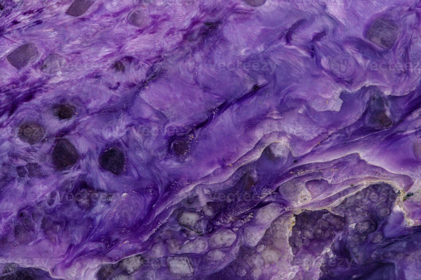 macro mineral stone Charoite on a white background photo