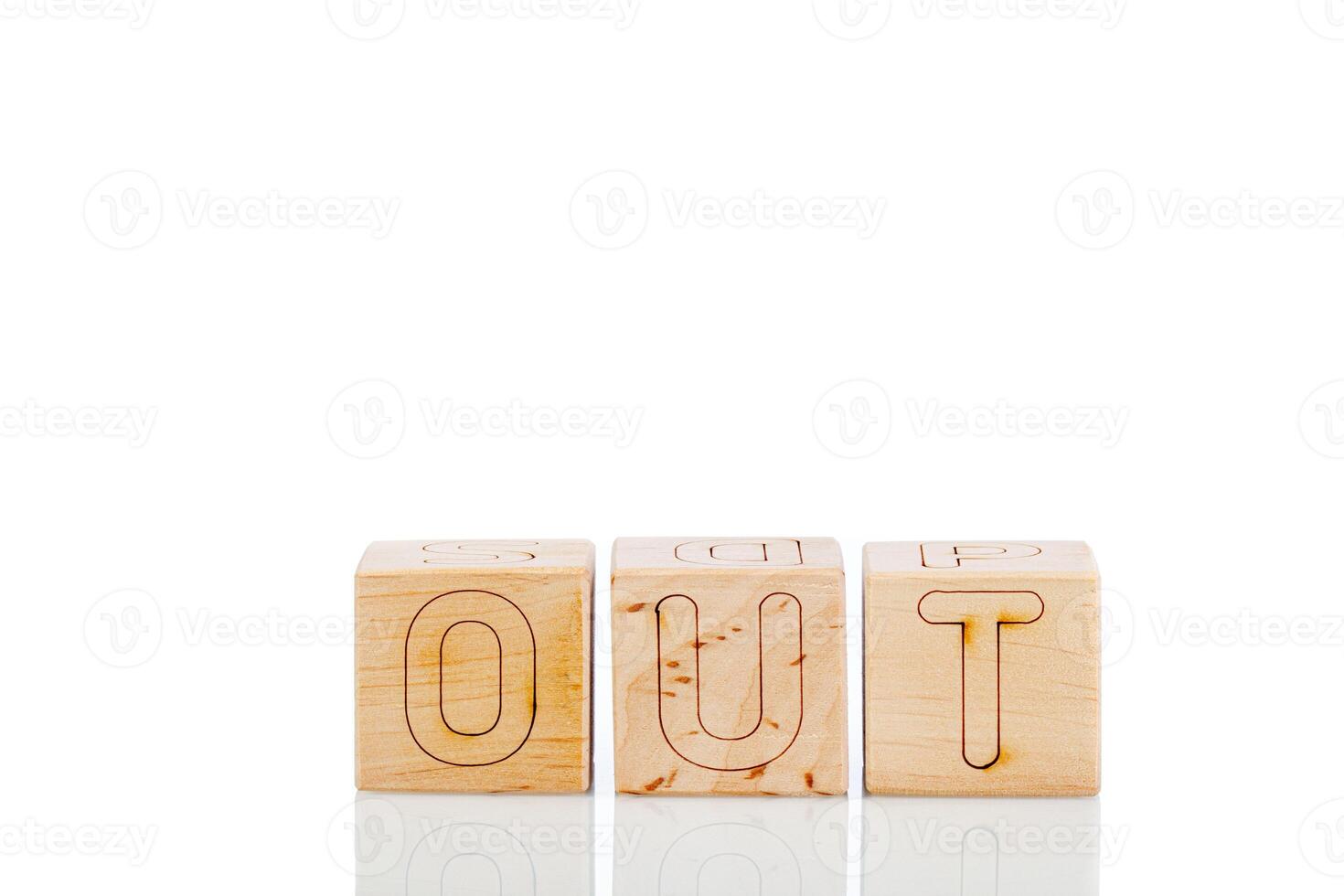 Wooden cubes with letters out on a white background photo