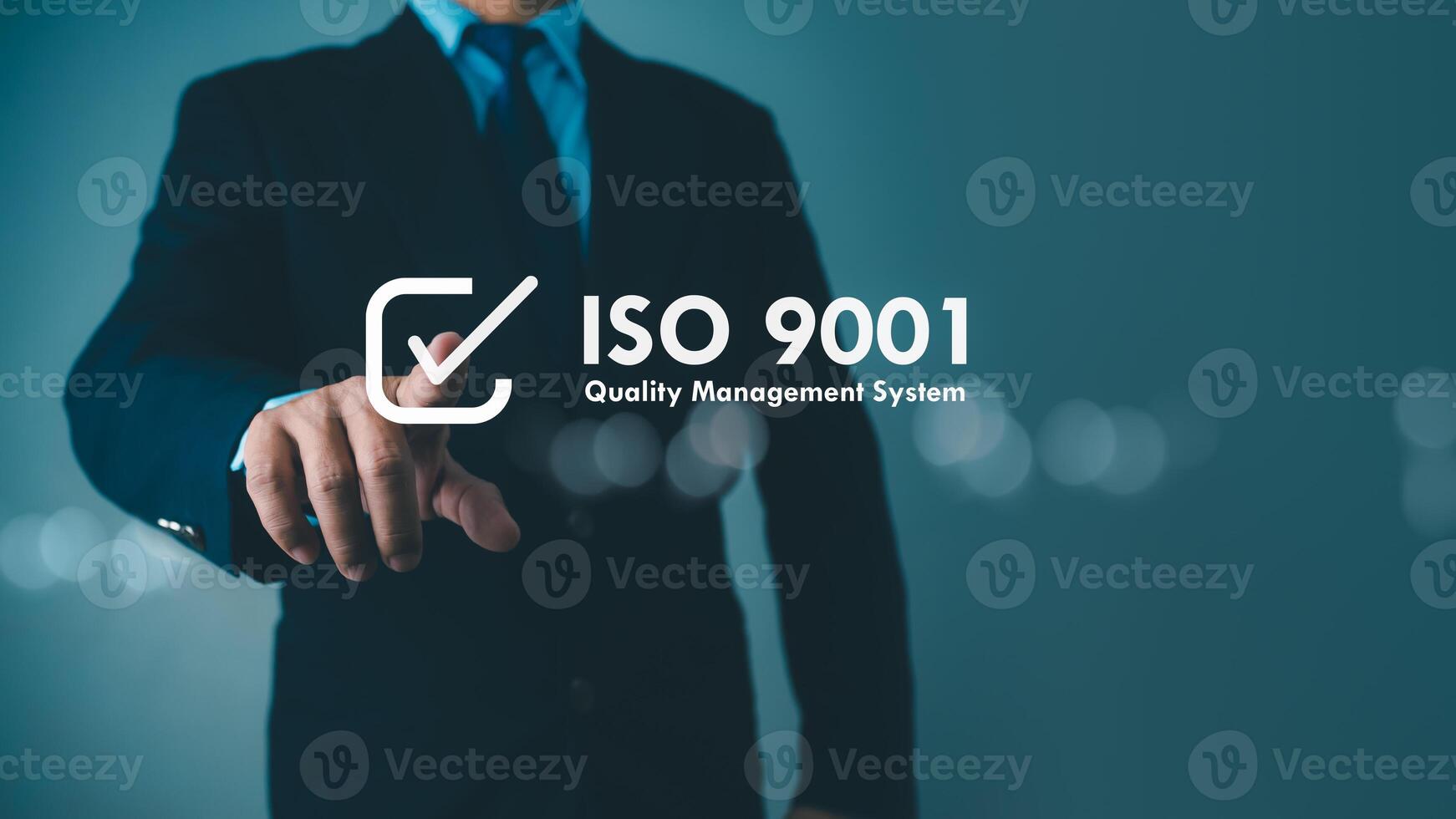ISO 9001 Standard certification standardisation quality control concept. Businessman point your finger at text ISO 9001 for quality management of organizations, Certified and quality. photo