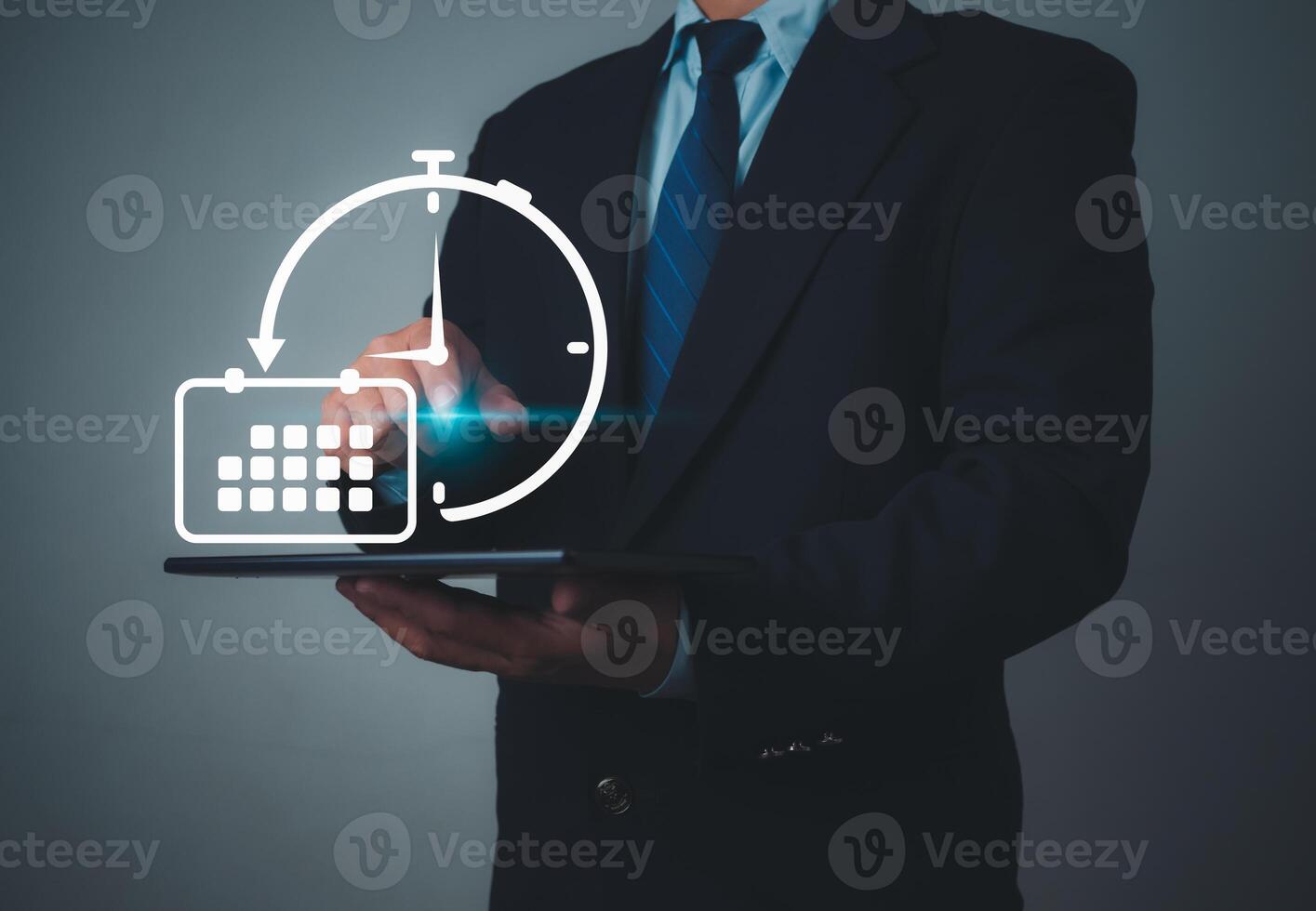 Businessman marking dates on virtual calendar, Time management concept, Planning work to increase efficiency, Business project planning, Effective time management and reduce working time. photo