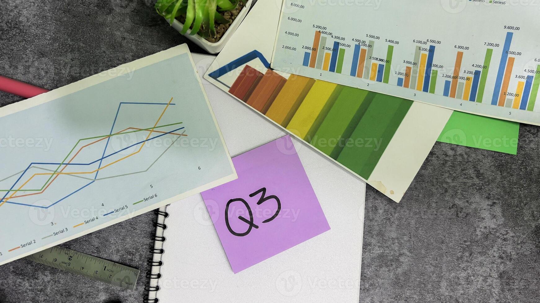 Q3 - 3rd Quarter Period write on sticky notes isolated on Office Desk. Stock market concept photo