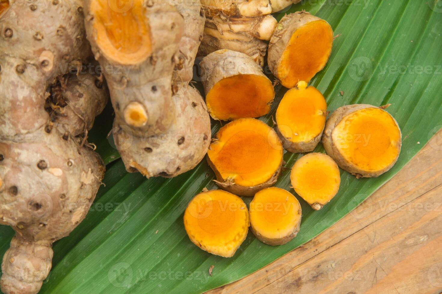 Turmeric or Curcuma longa Linn or rhizome root, a tuber plant that has a distinctive color and aroma photo