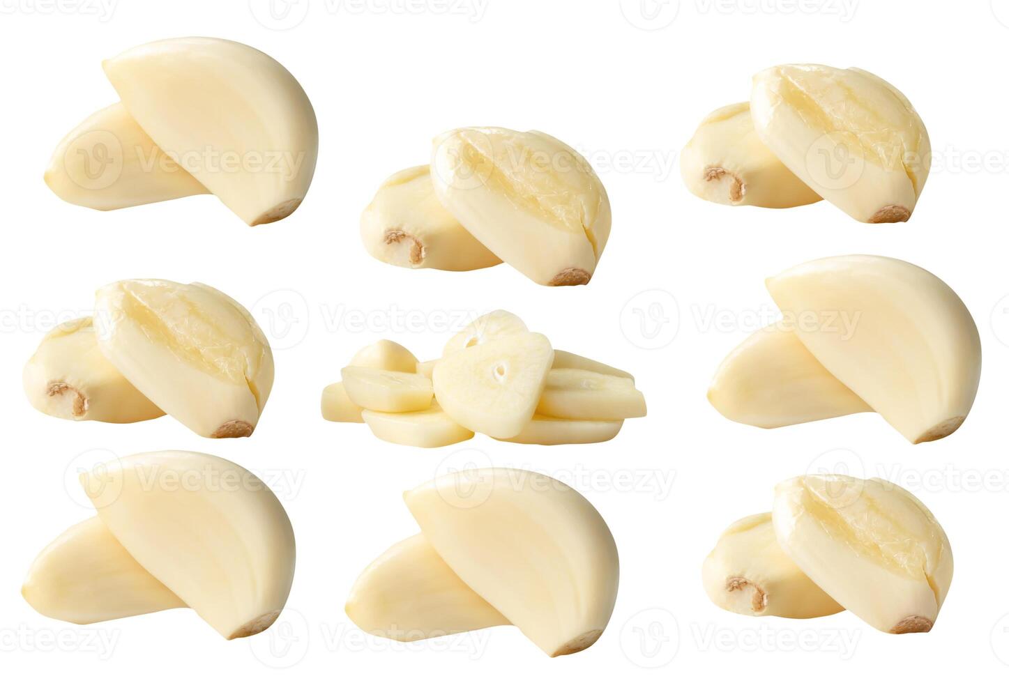 Side view set of fresh peeled white garlic cloves with slices in stack isolated on white background with clipping path photo