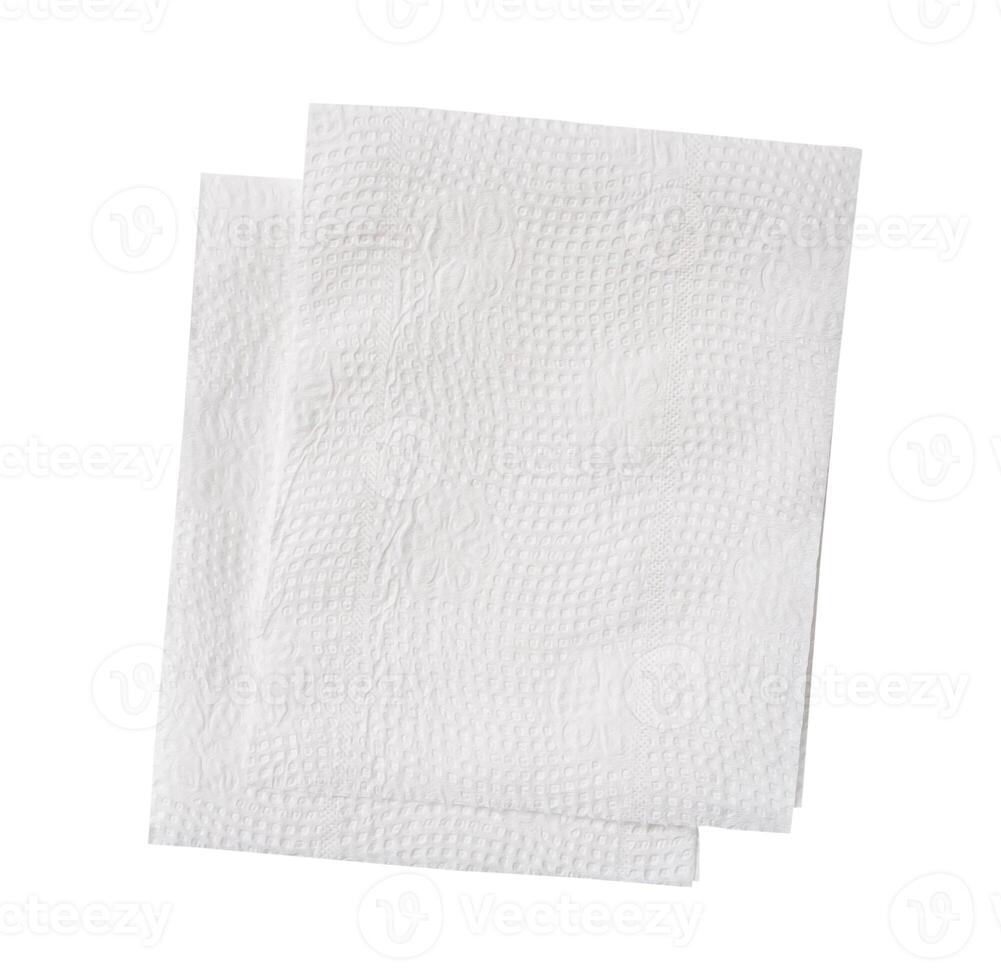 Top view of two pieces of folded white tissue paper or napkin paper in stack isolated on white background with clipping path photo