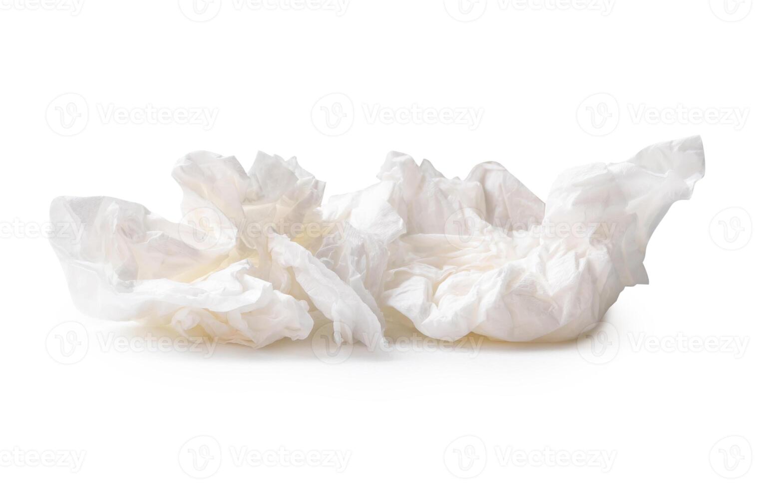 White screwed or crumpled tissue paper ball after use isolated on white background with clipping path photo