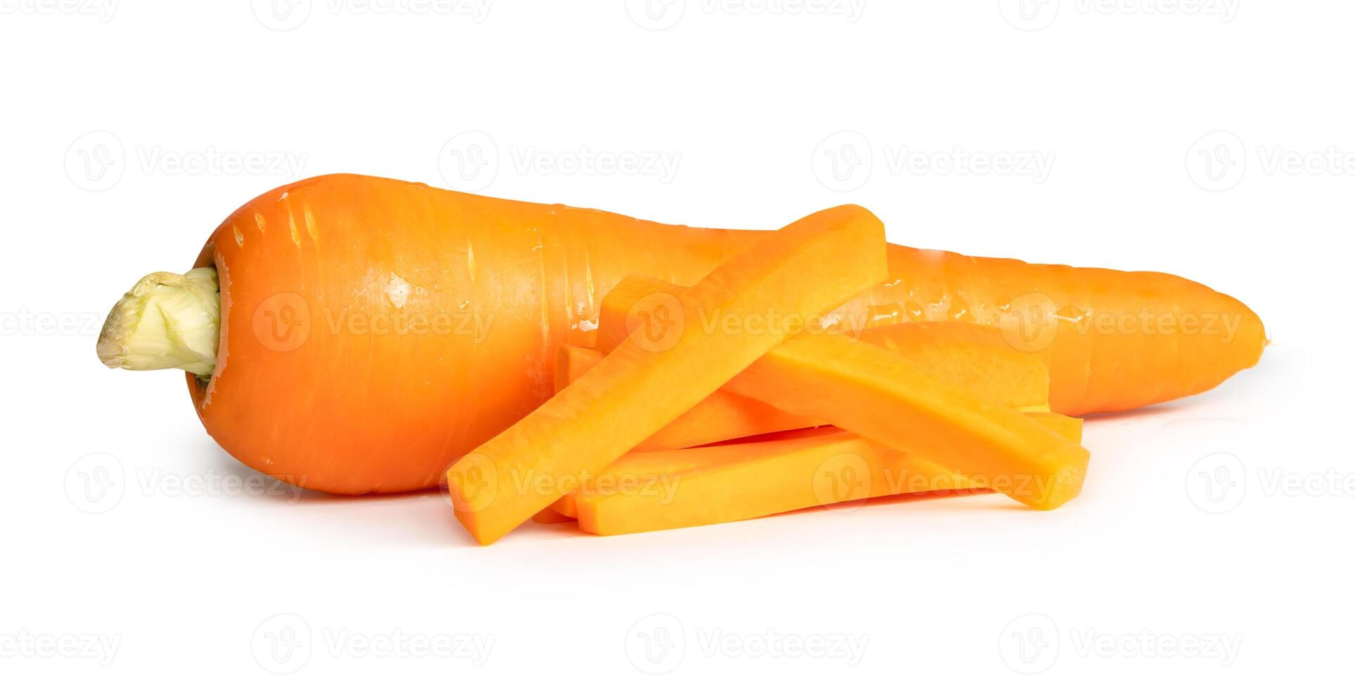 Side view of fresh orange carrot with slices in stick shape in stack isolated on white background with clipping path photo