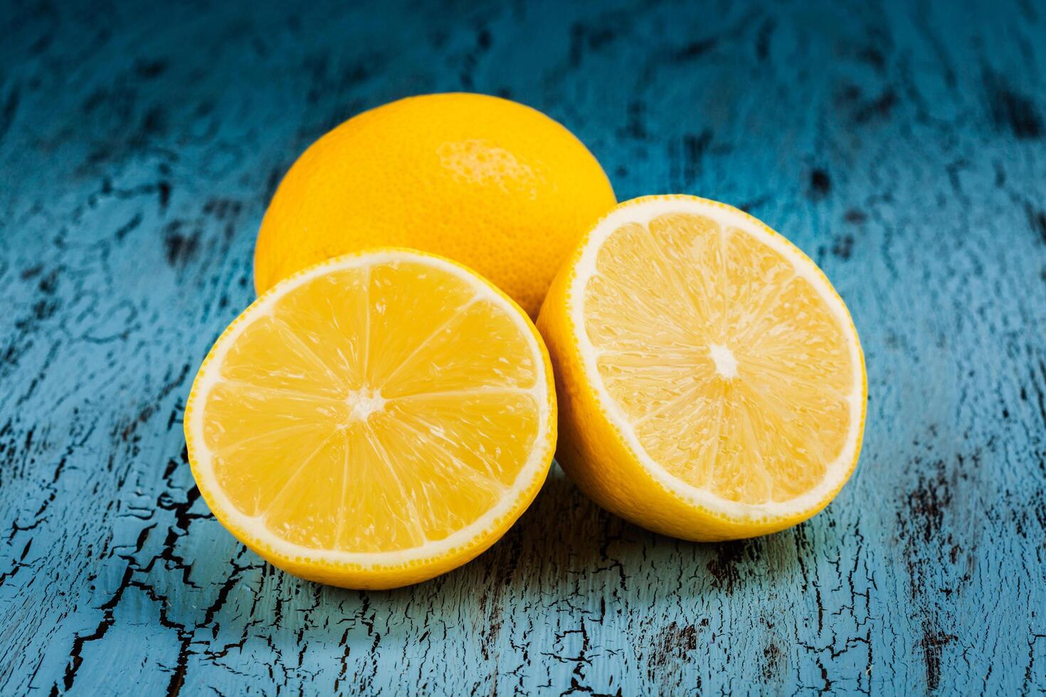 Lemon and cut half slices photo