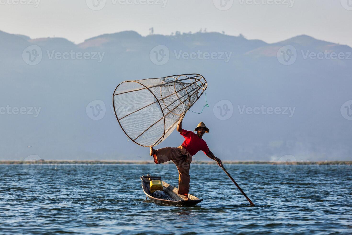Traditional Burmese fisherman at Inle lake photo