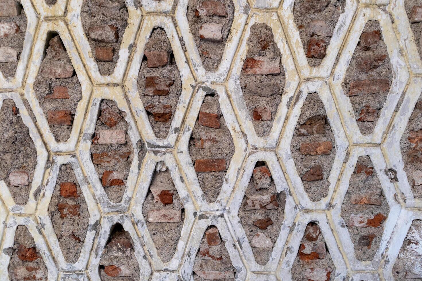 Red brick walls with hexagon prism patterns photo