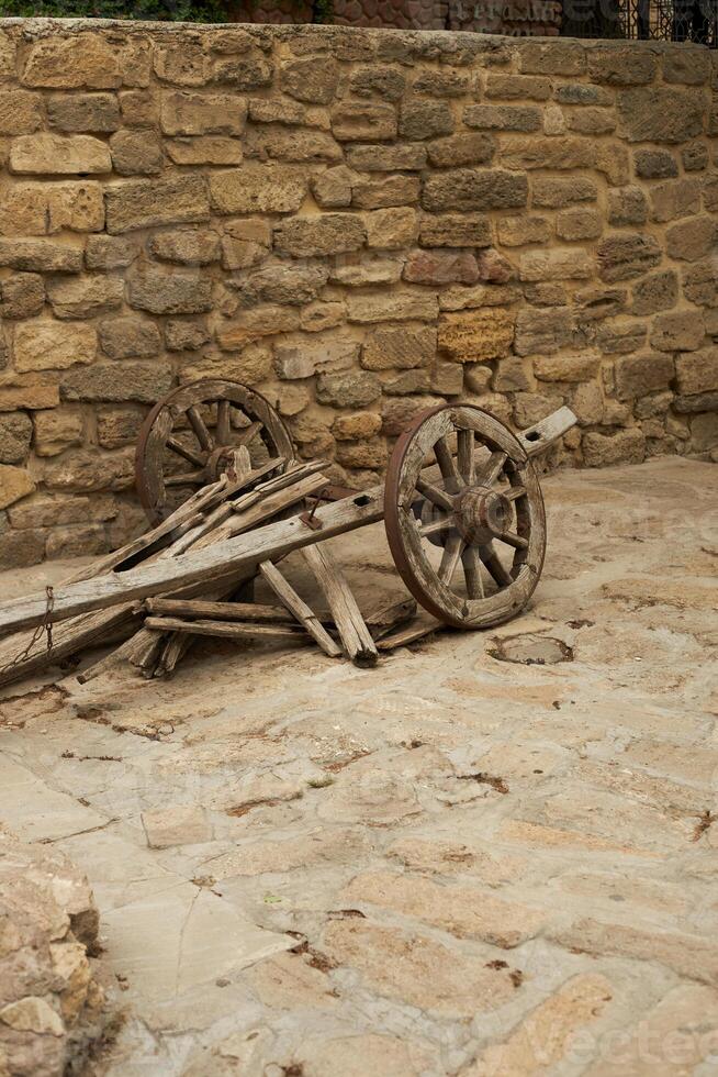 in the summer in the village an old wooden cart photo
