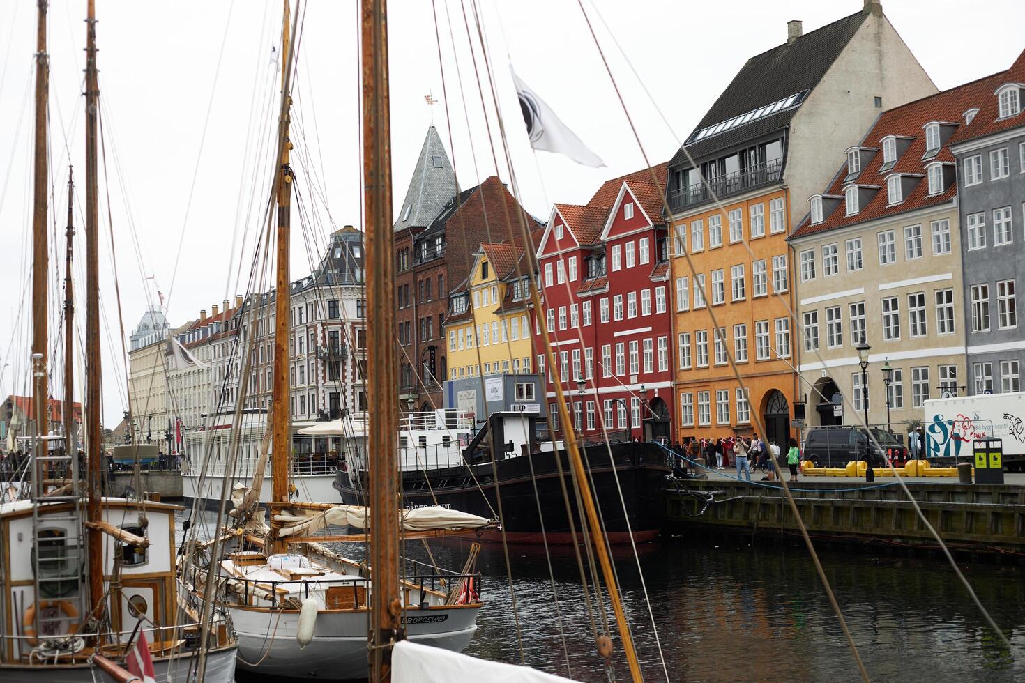 Copenhagen, Denmark - August 22, 2024. Colourful, captivating Nyhavn is one of the most iconic sights. photo