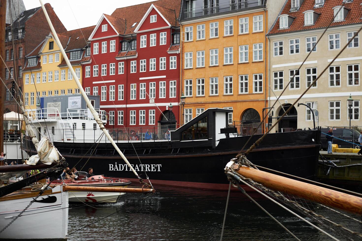 Copenhagen, Denmark - August 22, 2024. Colourful, captivating Nyhavn is one of the most iconic sights. photo