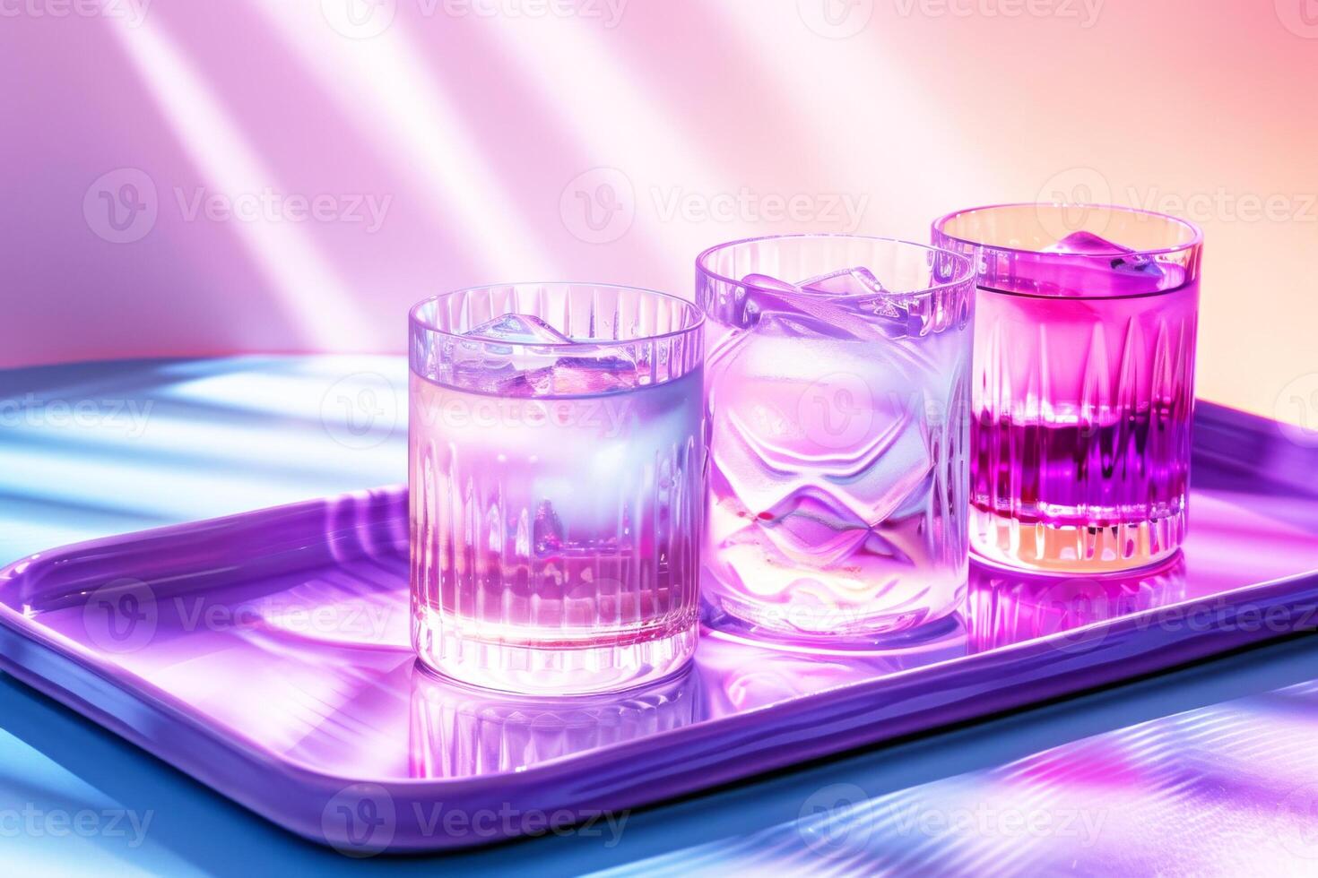 Three textured glass tumblers with cold drinks on a reflective purple tray, set within a transcendent purple to pink gradient ambiance. photo