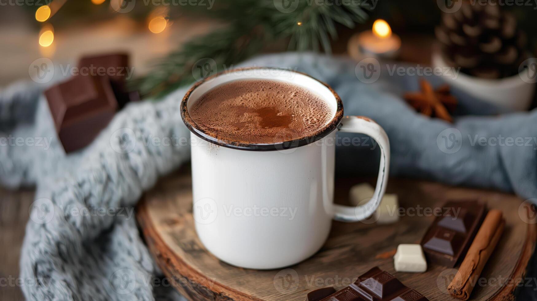 Cozy winter scene with homemade hot chocolate in a white enamel mug, surrounded by blanket photo