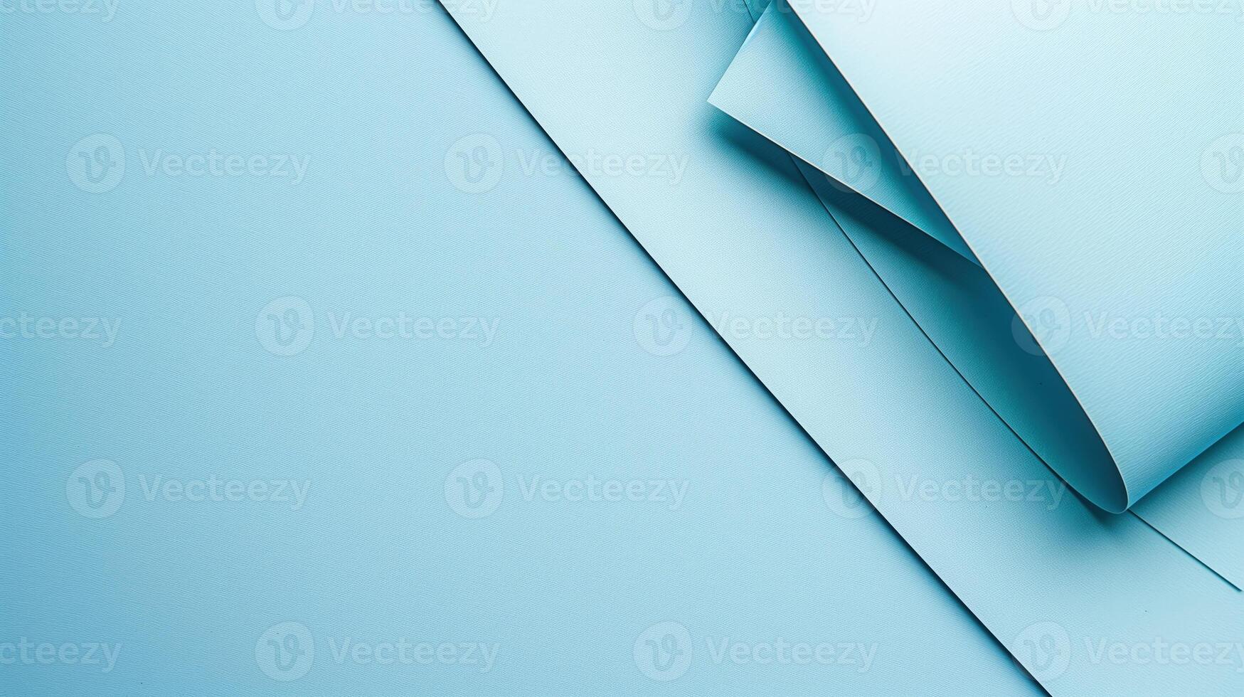 Close-up of overlapping blue paper sheets with clean lines and smooth texture, minimalist design photo