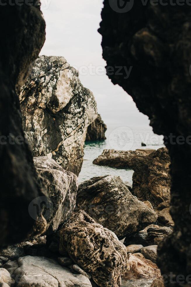 Amazing view of the Adriatic sea and the rocks near Budva. Travel destination in Montenegro. photo