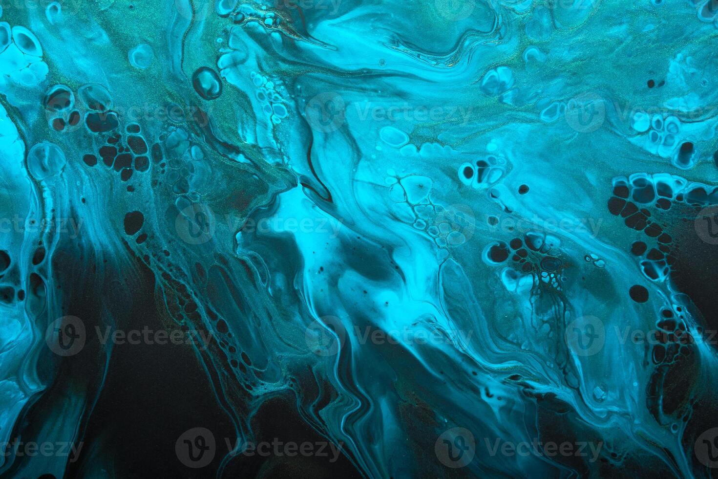 Fluid Art. Blue abstract wave swirls on black background. Marble effect background or texture photo