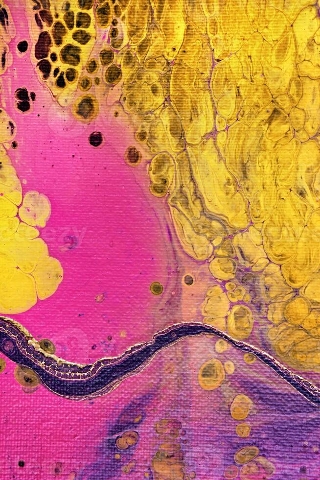 Acrylic Fluid Art. Yellow paint bubbles on magenta waves. Liquid Gold Wave on canvas. Digital decor. Abstract stone background or texture photo
