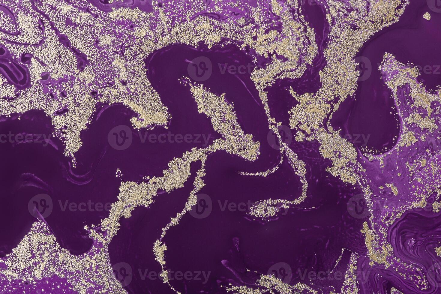 Gold sparkles wavy pattern on purple background. Acrylic Fluid Art. Abstract Art Deco background or texture photo