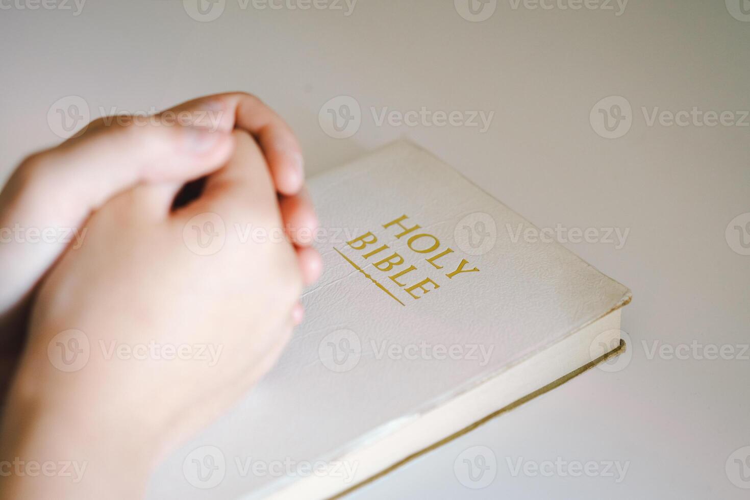 A Christian reads the Bible and drinks coffee. Religion concept. photo