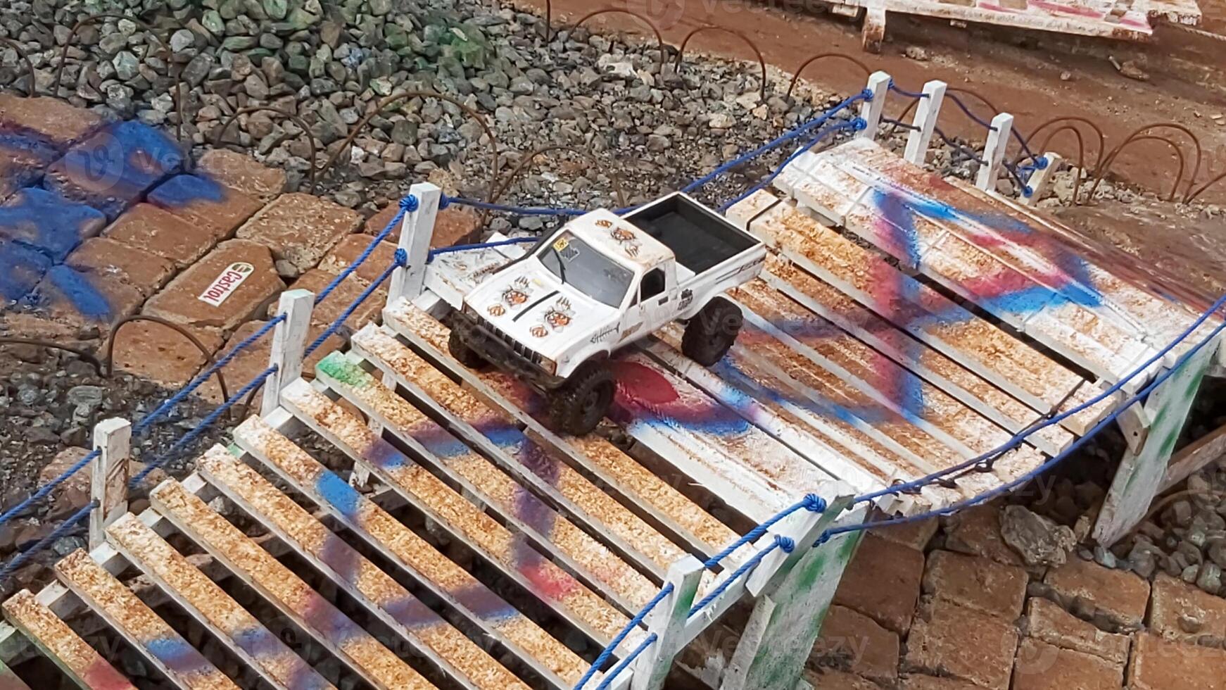Radio controlled off road car model movement race quickly moving on the road photo