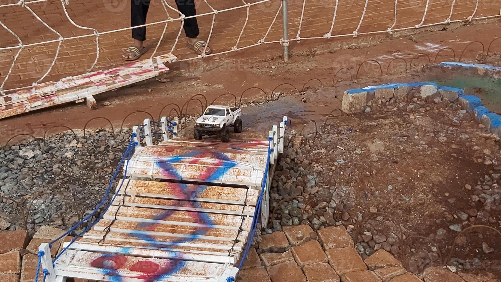 Radio controlled off road car model movement race quickly moving on the road photo