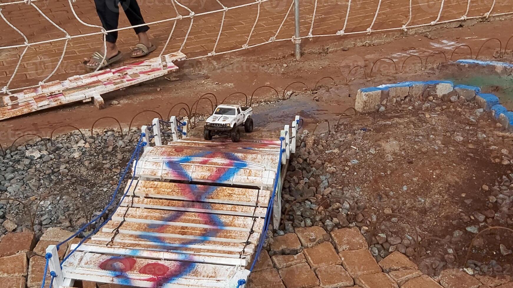 Radio controlled off road car model movement race quickly moving on the road photo