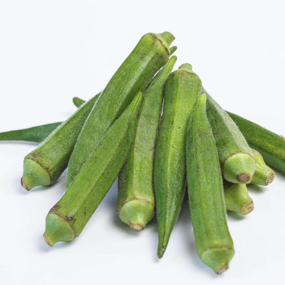 A pile okra on white background photo