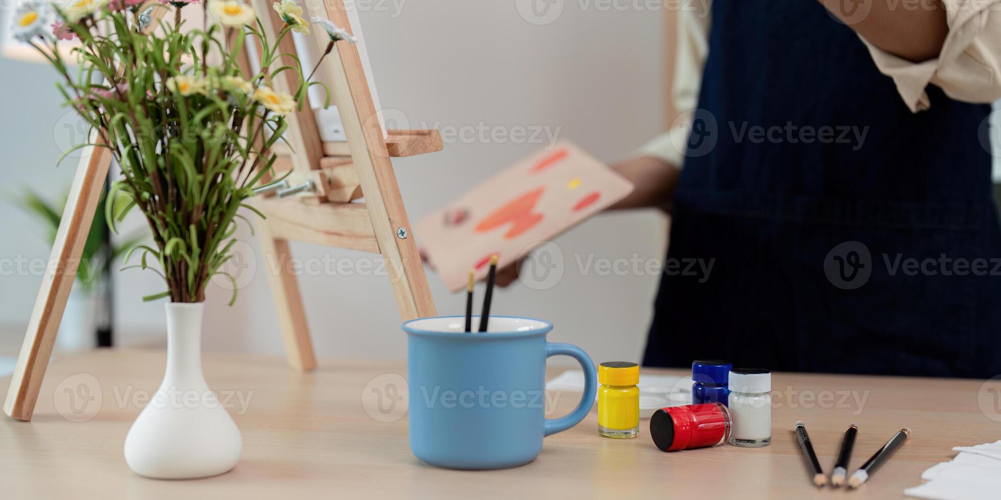 Art supplies arranged in a creative workspace photo
