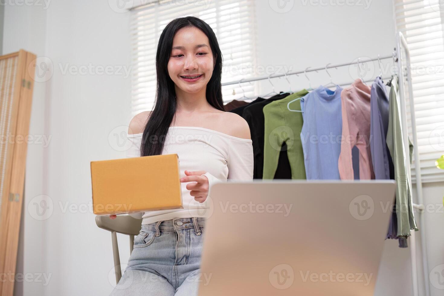 Young Entrepreneur Managing Online Clothing Store Orders. Ecommerce Strategy photo