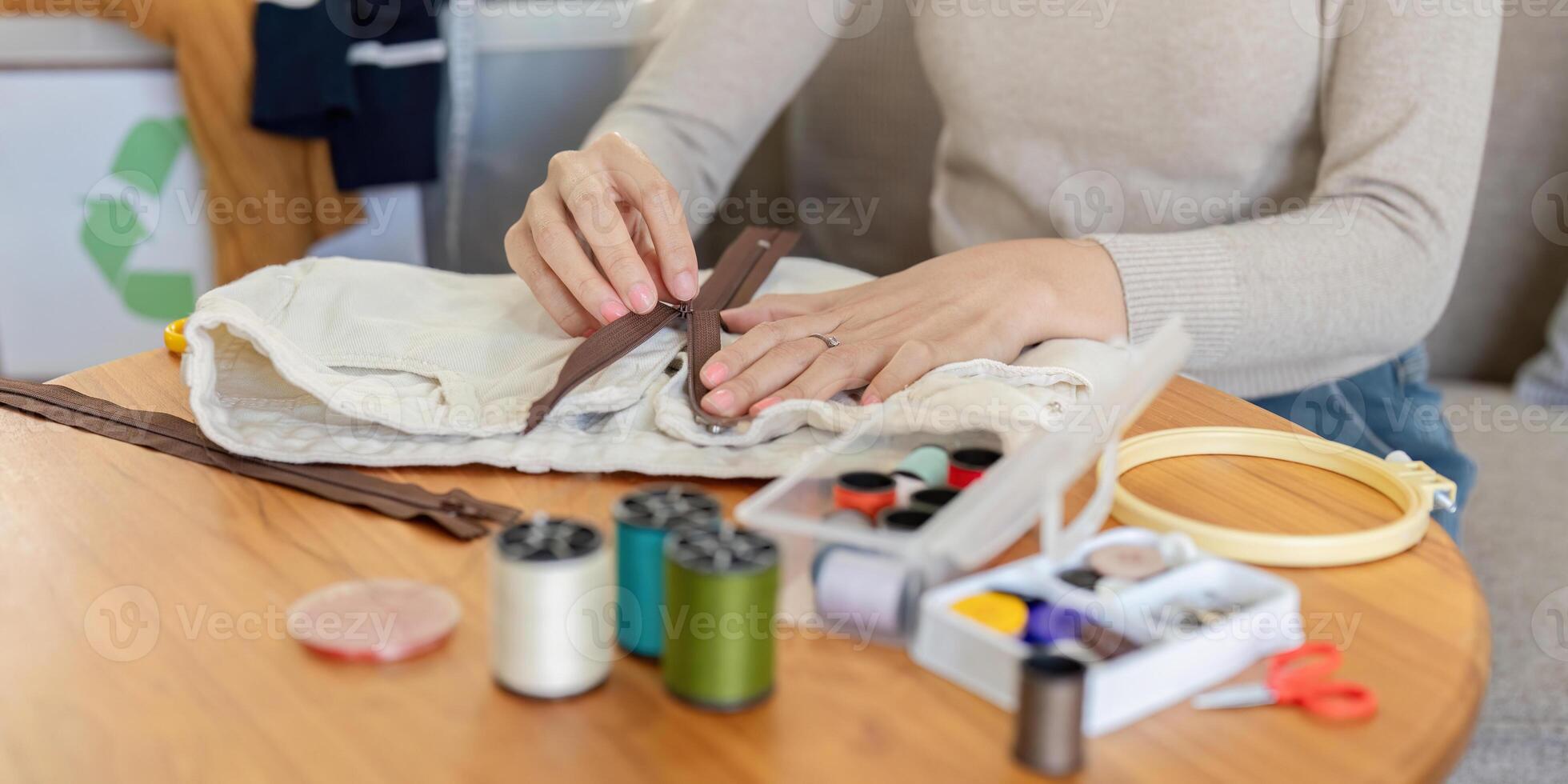 Sewing Enthusiast Fixing Zipper on Fabric. Home Crafting and Repair photo