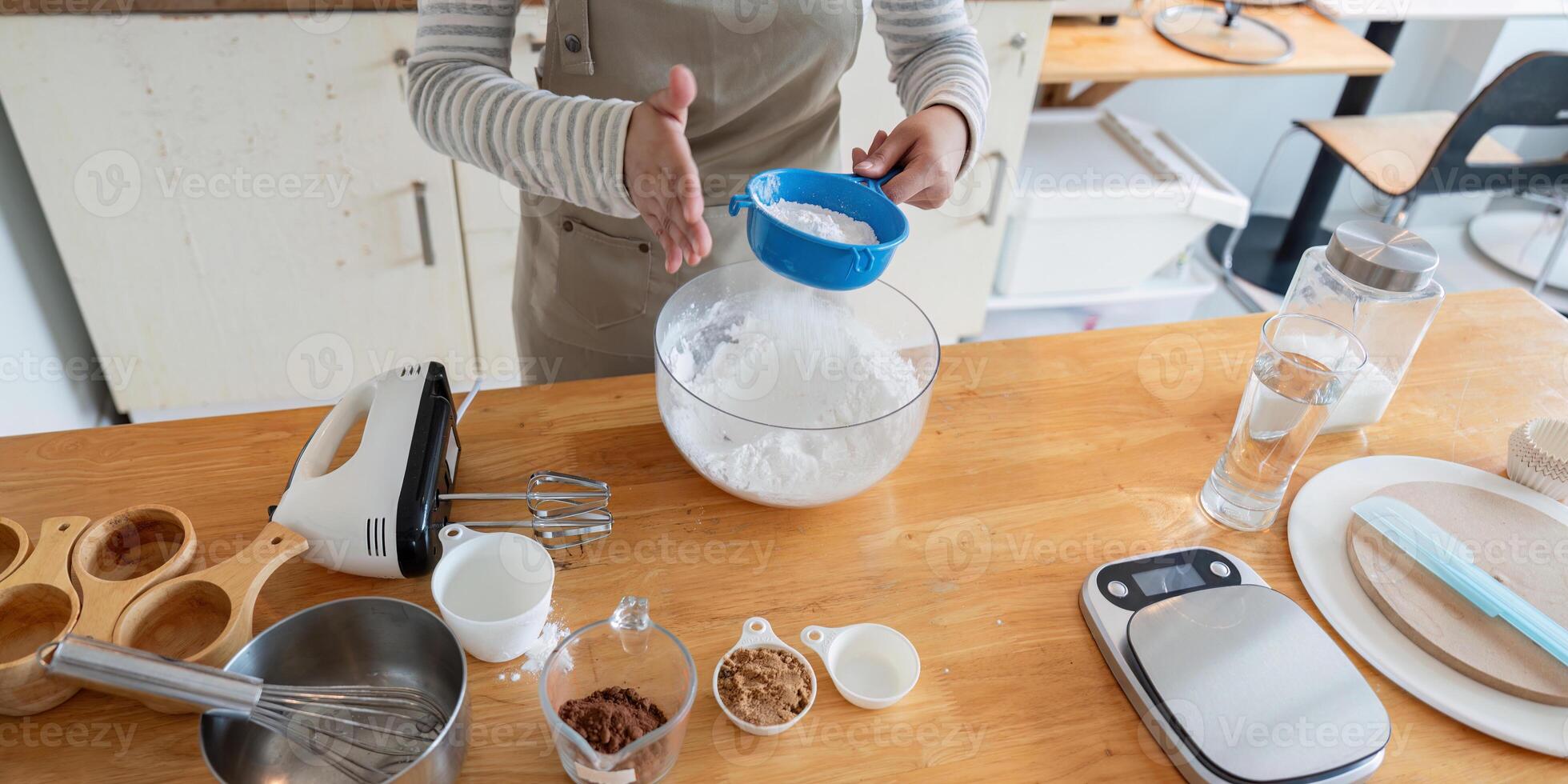 Professional setup for baking with bowls and kitchen tools photo