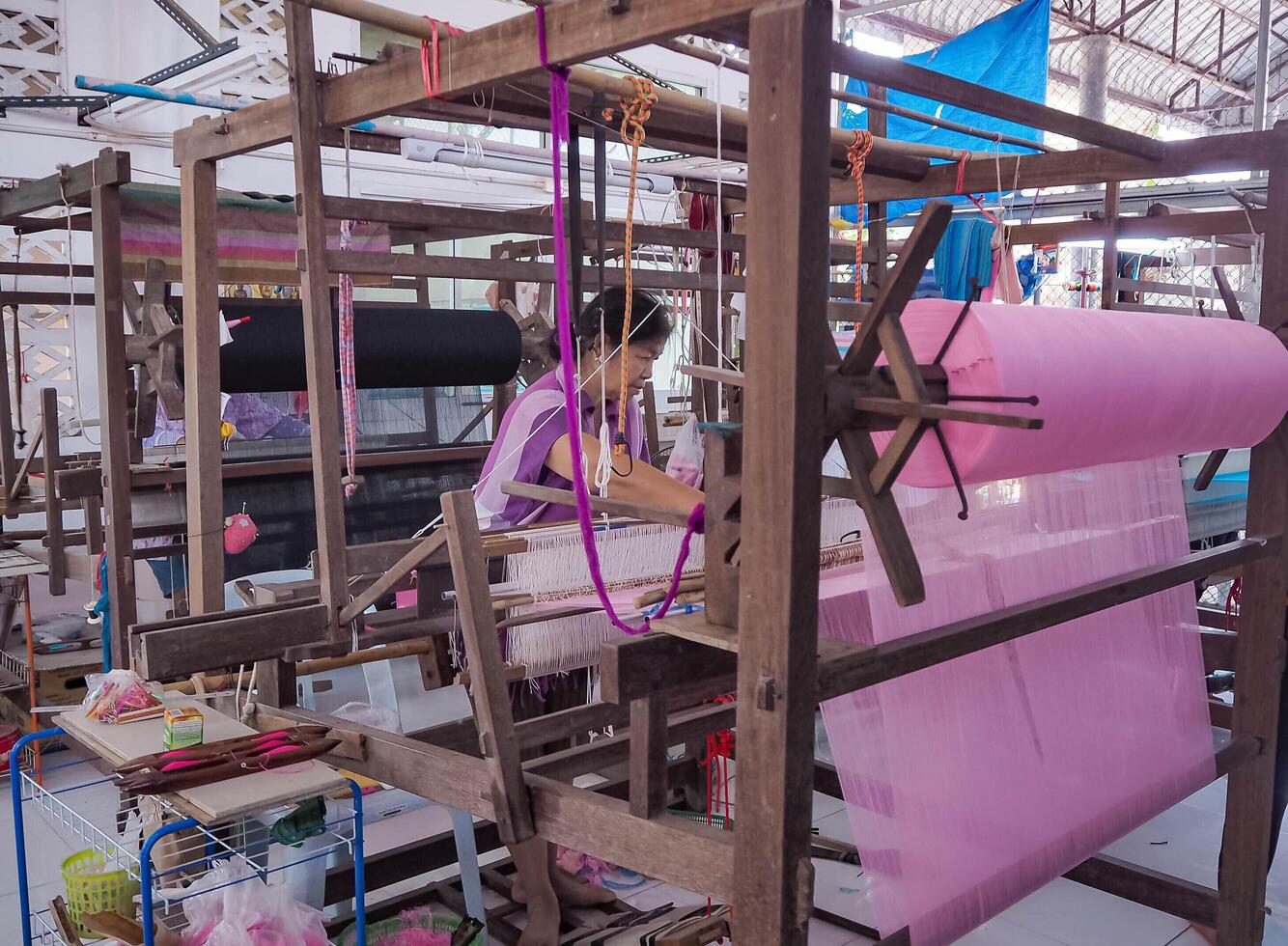 Teen Jok, a Thai local wisdom known for silk weaving, is located in western Thailand. photo