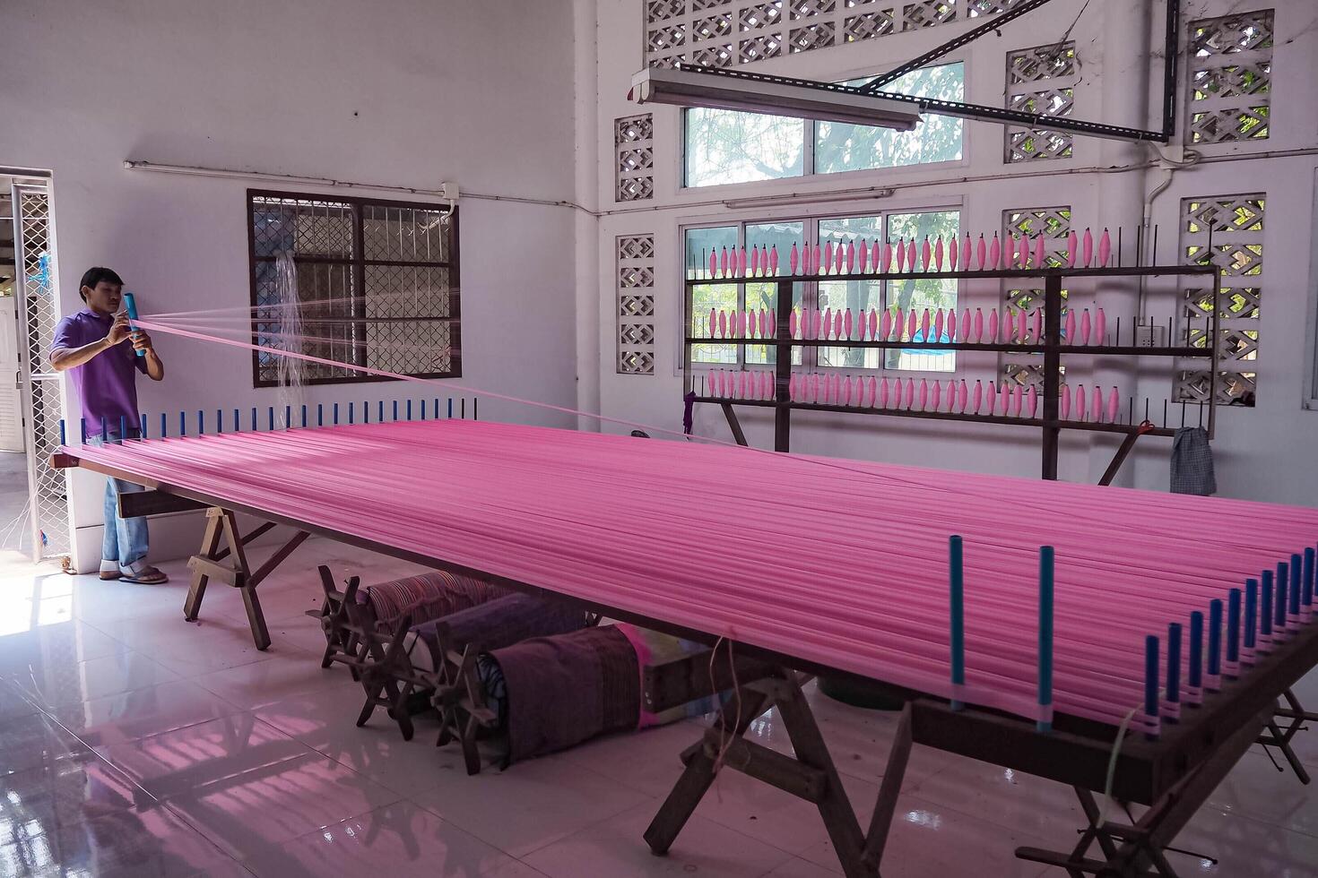 Teen Jok, a Thai local wisdom known for silk weaving, is located in western Thailand. photo