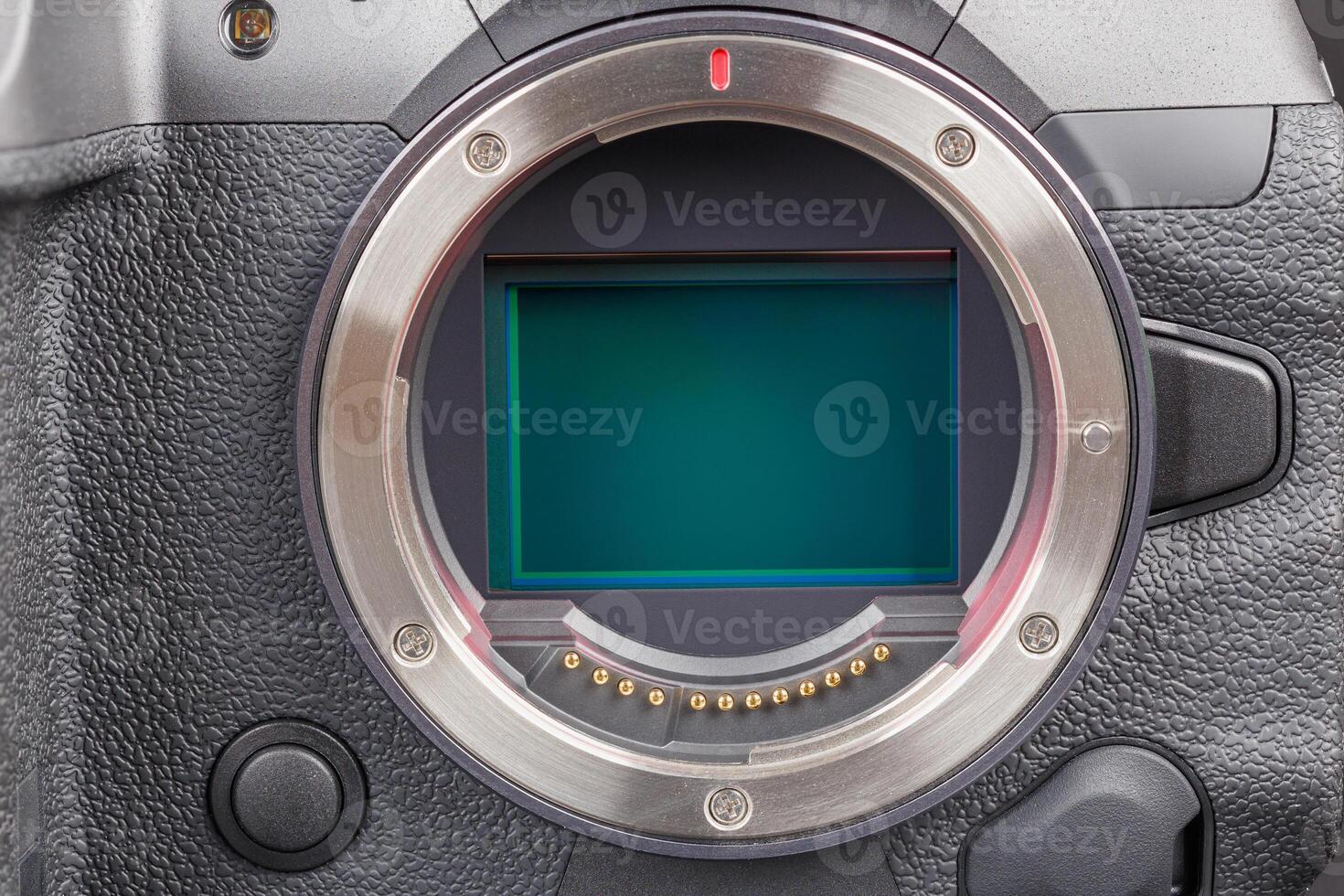 professional mirrorless camera body with exposed sensor full-frame closeup view photo